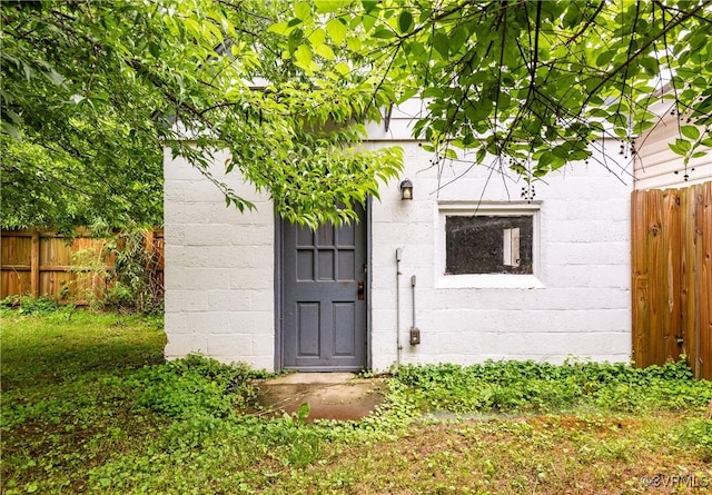 2711 Maplewood Rd, Henrico, VA 23228 - doorway to property with concrete block siding