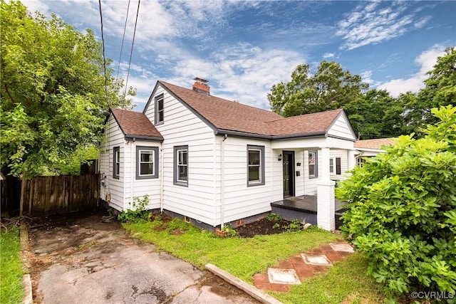 2711 Maplewood Rd, Henrico, VA 23228 - view of front facade with a chimney and roof with shingles
