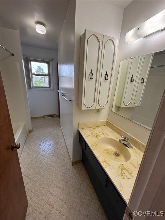 full bathroom with vanity and bathing tub / shower combination