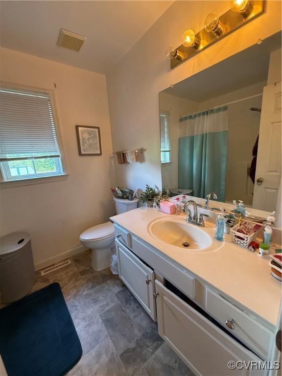 21338 Deodora Ct, Petersburg, VA 23803 - bathroom featuring vanity and curtained shower