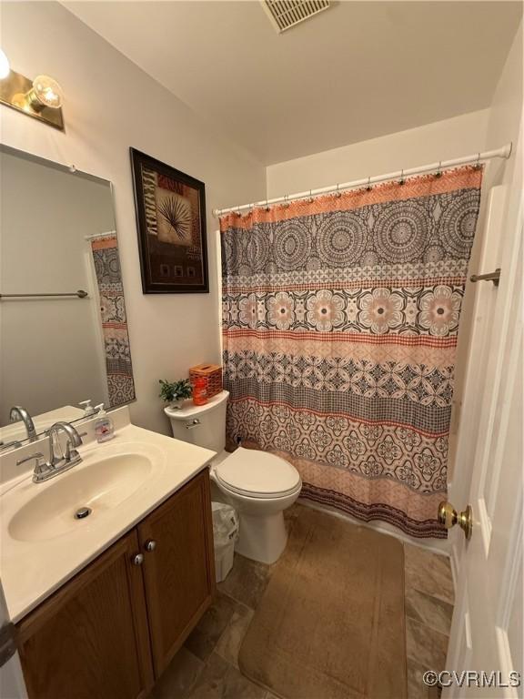 21338 Deodora Ct, Petersburg, VA 23803 - bathroom featuring vanity and curtained shower