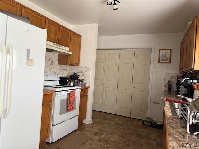 21338 Deodora Ct, Petersburg, VA 23803 - kitchen featuring white appliances, under cabinet range hood, tasteful backsplash, and brown cabinets