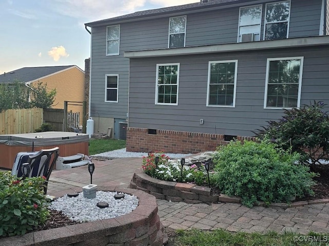 10818 Sebring Dr, Henrico, VA 23233 - rear view of property with a hot tub, a patio, and crawl space