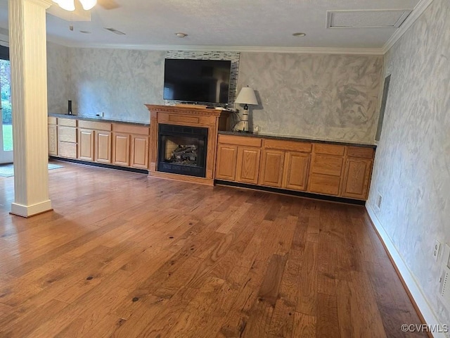 10818 Sebring Dr, Henrico, VA 23233 - unfurnished living room with hardwood / wood-style flooring, ornamental molding, wallpapered walls, and a fireplace
