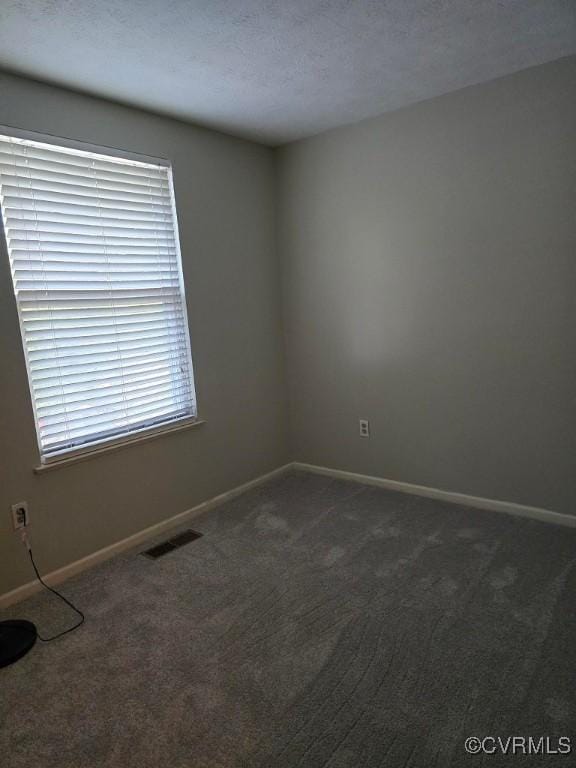 10818 Sebring Dr, Henrico, VA 23233 - empty room featuring dark carpet