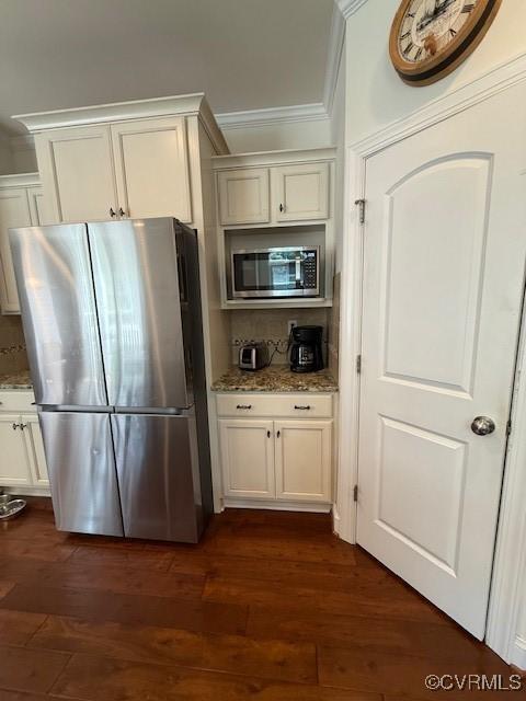 17037 Windon Ct, Moseley, VA 23120 - kitchen with appliances with stainless steel finishes, backsplash, light stone counters, white cabinetry, and crown molding