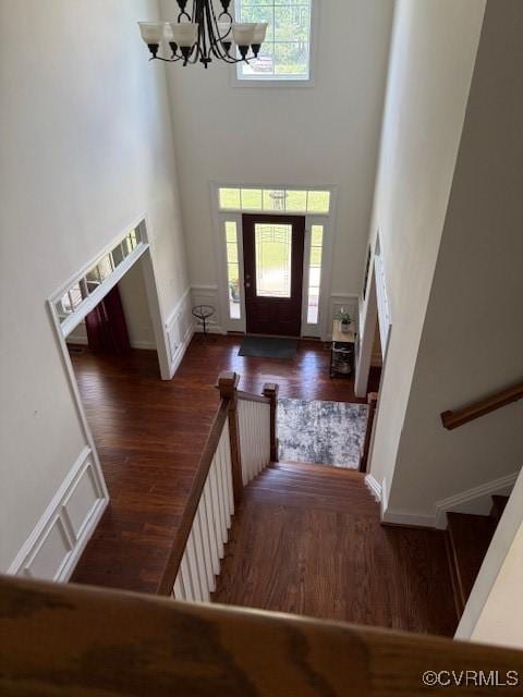 17037 Windon Ct, Moseley, VA 23120 - entrance foyer with wood finished floors, a chandelier, a high ceiling, and stairs
