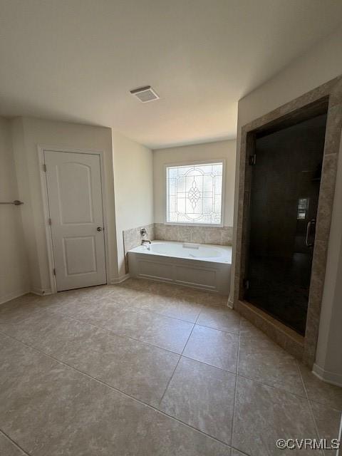 17037 Windon Ct, Moseley, VA 23120 - full bath featuring tile patterned flooring, a bath, and a stall shower