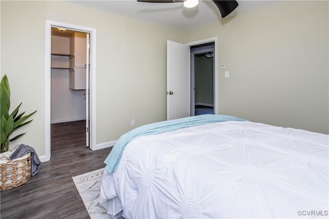 9300 Greatbridge Rd, Chesterfield, VA 23237 - bedroom with a walk in closet, wood finished floors, and ceiling fan