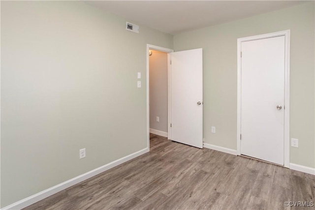 9300 Greatbridge Rd, Chesterfield, VA 23237 - unfurnished bedroom with wood finished floors and baseboards
