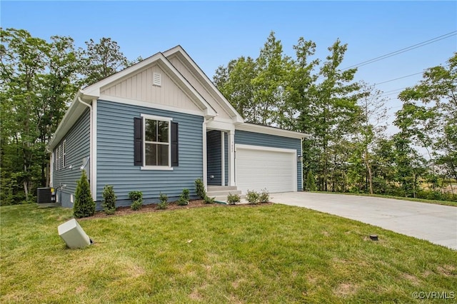 7082 Braxton Ct, Ladysmith, VA 22546 - view of front facade with an attached garage, concrete driveway, board and batten siding, and a front lawn