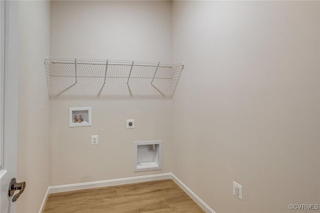 7082 Braxton Ct, Ladysmith, VA 22546 - laundry area with electric dryer hookup, washer hookup, and light wood-style flooring