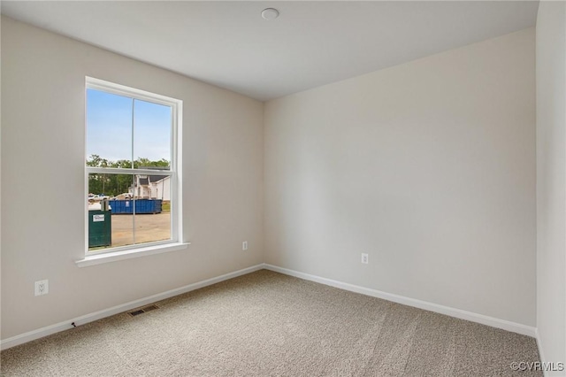 7082 Braxton Ct, Ladysmith, VA 22546 - empty room with carpet flooring and baseboards