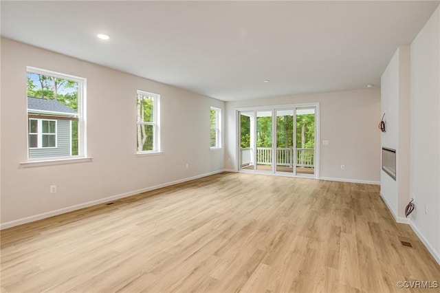 7082 Braxton Ct, Ladysmith, VA 22546 - unfurnished room with light wood finished floors and recessed lighting
