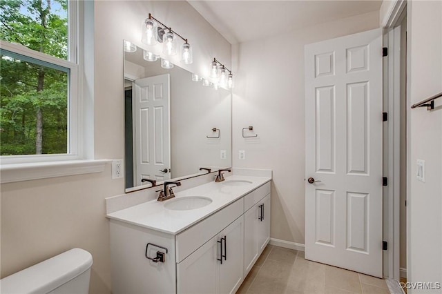 7082 Braxton Ct, Ladysmith, VA 22546 - bathroom with double vanity and tile patterned flooring