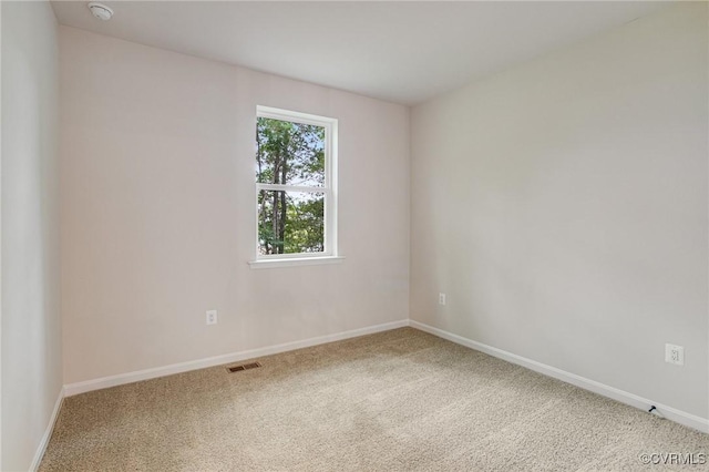 7082 Braxton Ct, Ladysmith, VA 22546 - spare room with carpet and a smoke detector