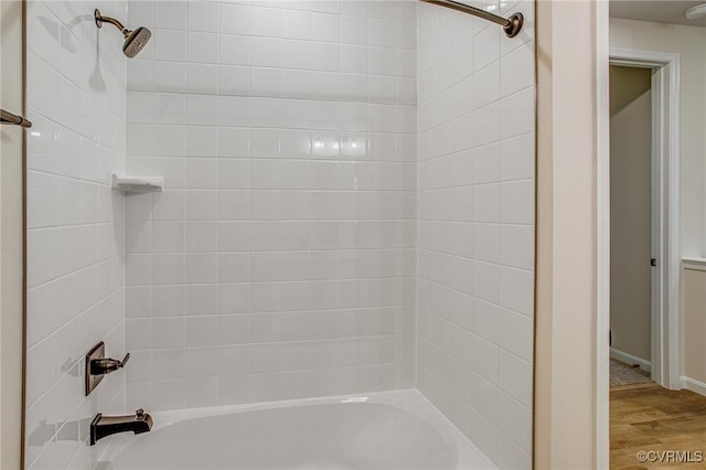 7082 Braxton Ct, Ladysmith, VA 22546 - bathroom with  shower combination and wood finished floors