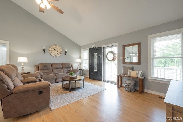 8622 Rock Cedar Rd, New Kent, VA 23124 - living area with ceiling fan, wood finished floors, and high vaulted ceiling
