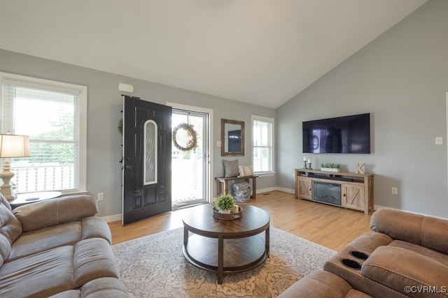 8622 Rock Cedar Rd, New Kent, VA 23124 - living room featuring light wood-style flooring and lofted ceiling