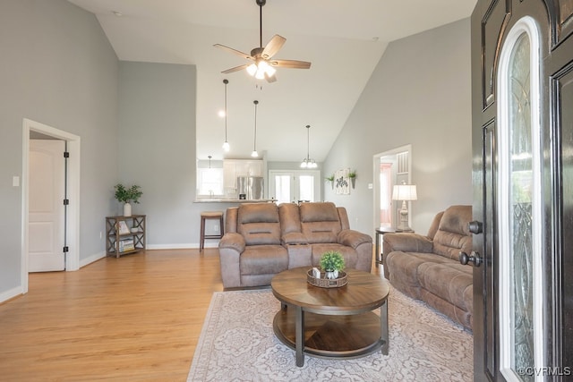 8622 Rock Cedar Rd, New Kent, VA 23124 - living area featuring high vaulted ceiling, ceiling fan, and light wood-style flooring