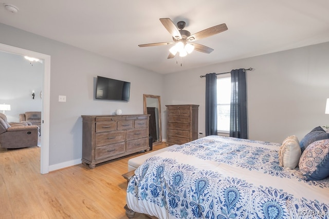 8622 Rock Cedar Rd, New Kent, VA 23124 - bedroom with light wood-style floors and ceiling fan