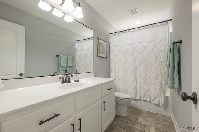 8622 Rock Cedar Rd, New Kent, VA 23124 - bathroom featuring vanity, stone finish flooring, and shower / bath combo with shower curtain