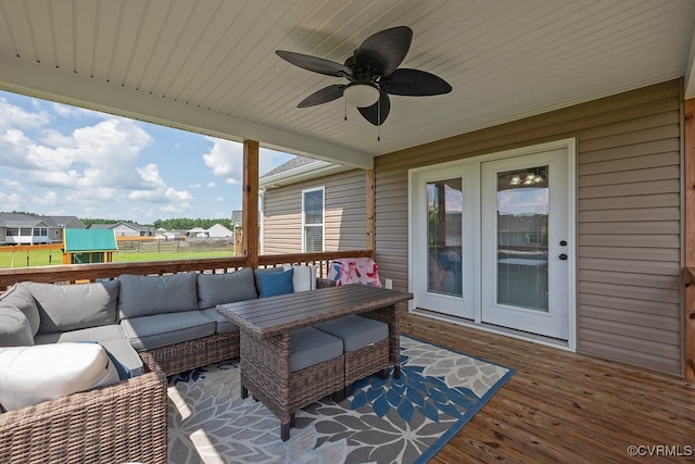 8622 Rock Cedar Rd, New Kent, VA 23124 - wooden deck with french doors, outdoor lounge area, ceiling fan, and a residential view