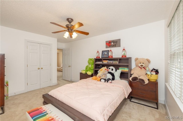 4837 Glenmorgan Ct, Chester, VA 23831 - bedroom featuring carpet, a closet, ceiling fan, and a textured ceiling