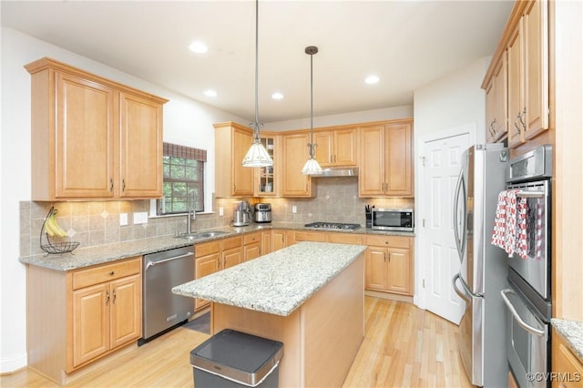 4837 Glenmorgan Ct, Chester, VA 23831 - kitchen featuring appliances with stainless steel finishes, light wood-style flooring, light brown cabinetry, light stone counters, and recessed lighting