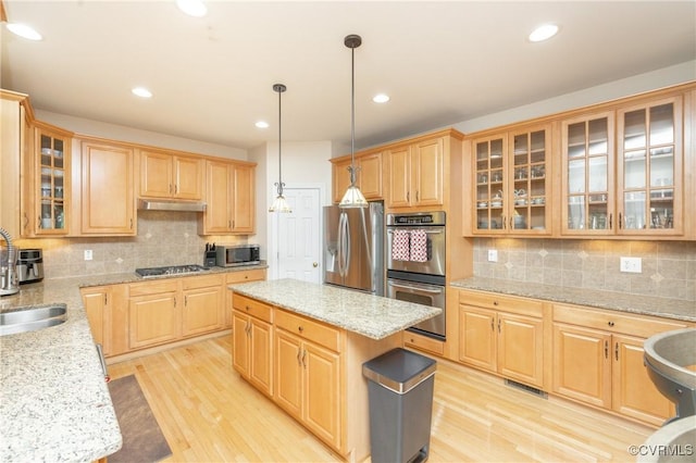 4837 Glenmorgan Ct, Chester, VA 23831 - kitchen featuring stainless steel appliances, light brown cabinets, light wood-type flooring, tasteful backsplash, and recessed lighting