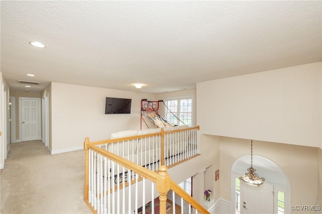 4837 Glenmorgan Ct, Chester, VA 23831 - hallway with an upstairs landing, a textured ceiling, light colored carpet, and recessed lighting