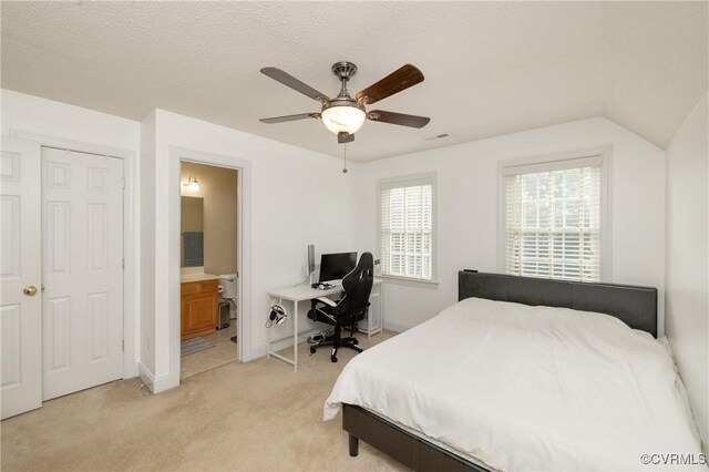 4837 Glenmorgan Ct, Chester, VA 23831 - bedroom featuring light carpet, ensuite bathroom, an office area, and a ceiling fan