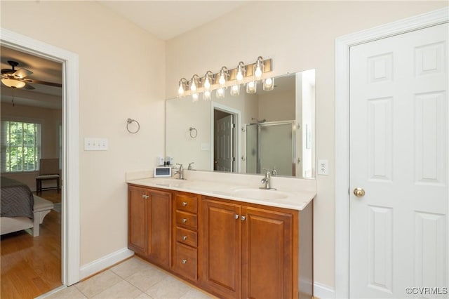 4837 Glenmorgan Ct, Chester, VA 23831 - ensuite bathroom featuring double vanity, a shower stall, tile patterned flooring, and ceiling fan