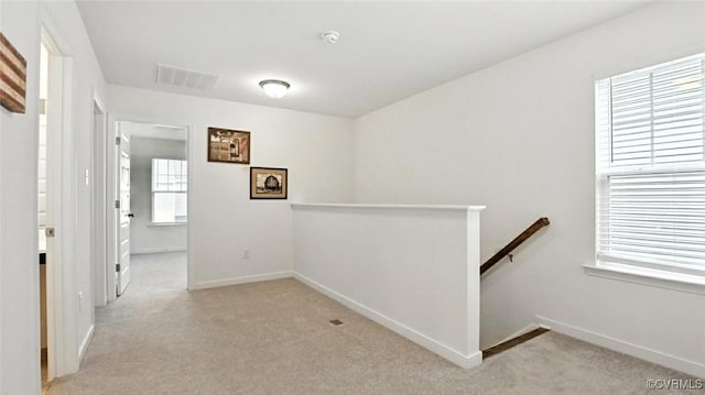 7750 Leeds Castle Ln, New Kent, VA 23124 - hall featuring an upstairs landing and light colored carpet