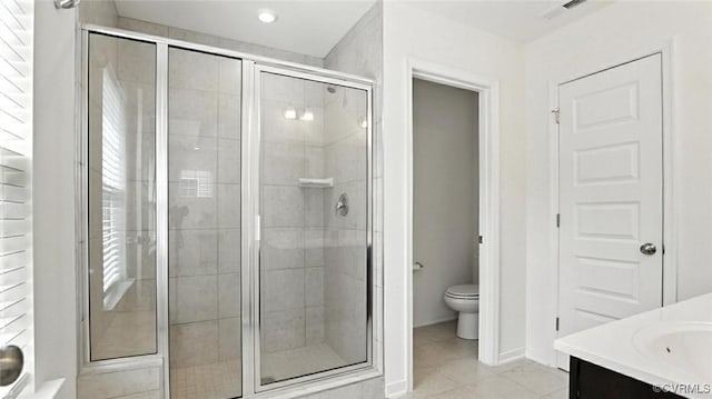 7750 Leeds Castle Ln, New Kent, VA 23124 - bathroom with a stall shower, vanity, tile patterned flooring, and recessed lighting