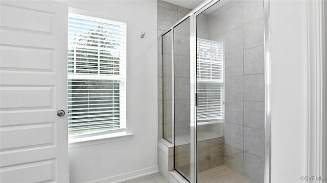 7750 Leeds Castle Ln, New Kent, VA 23124 - bathroom featuring a stall shower and plenty of natural light
