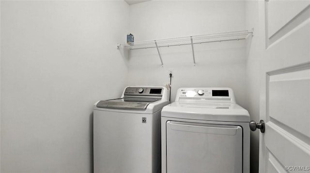 7750 Leeds Castle Ln, New Kent, VA 23124 - washroom with washer and dryer