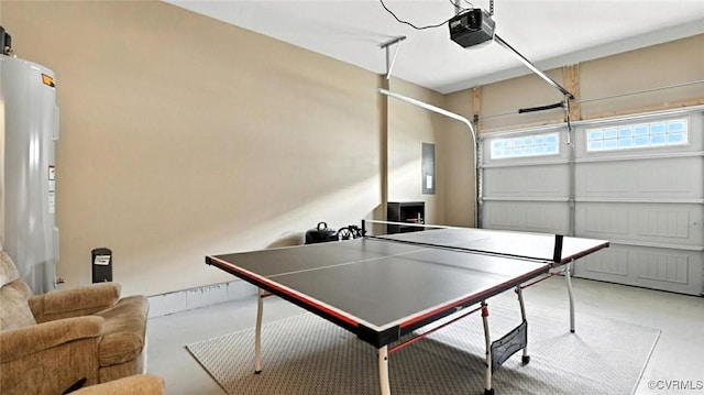 7750 Leeds Castle Ln, New Kent, VA 23124 - recreation room with a garage, concrete floors, electric water heater, and electric panel