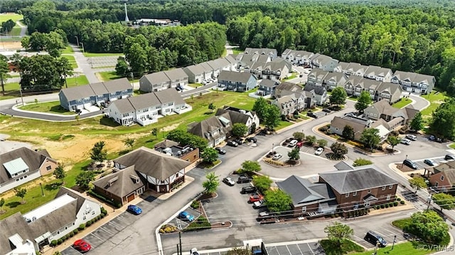 7750 Leeds Castle Ln, New Kent, VA 23124 - aerial view of residential area featuring a heavily wooded area
