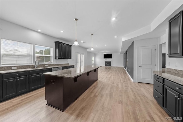 10485 Eagle Ct, Prince George, VA 23860 - kitchen with open floor plan, a kitchen island, stainless steel dishwasher, stone counters, and recessed lighting