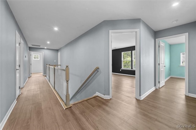 10485 Eagle Ct, Prince George, VA 23860 - hall with an upstairs landing, light wood-style flooring, and recessed lighting