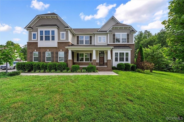 10485 Eagle Ct, Prince George, VA 23860 - craftsman-style home with brick siding, covered porch, and a front lawn