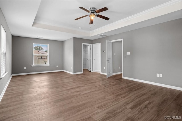 10485 Eagle Ct, Prince George, VA 23860 - unfurnished bedroom with a raised ceiling, wood finished floors, crown molding, a ceiling fan, and a spacious closet