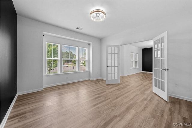 10485 Eagle Ct, Prince George, VA 23860 - unfurnished room featuring french doors and light wood-type flooring