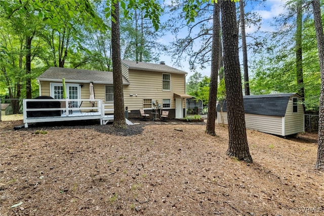 5564 Heatherhill Dr, North Chesterfield, VA 23234 - rear view of house featuring a storage unit and a wooden deck