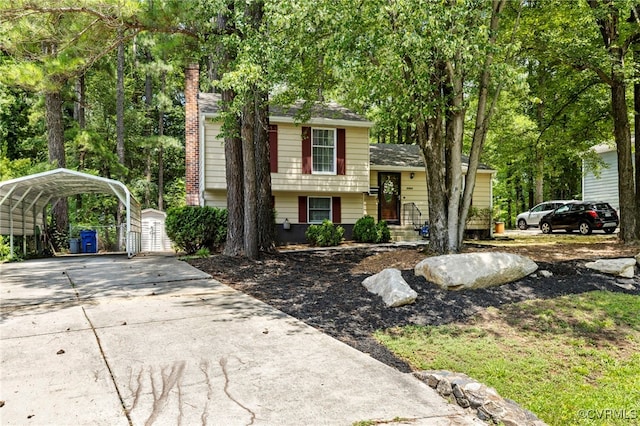 5564 Heatherhill Dr, North Chesterfield, VA 23234 - tri-level home with a detached carport, driveway, and a chimney