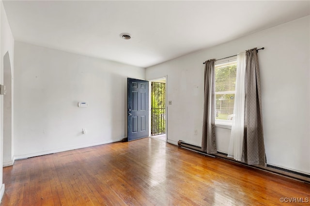 125 Seaboard St, Petersburg, VA 23803 - spare room with wood-type flooring and arched walkways