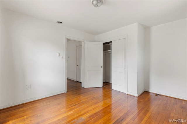125 Seaboard St, Petersburg, VA 23803 - unfurnished bedroom with light wood-type flooring and a closet