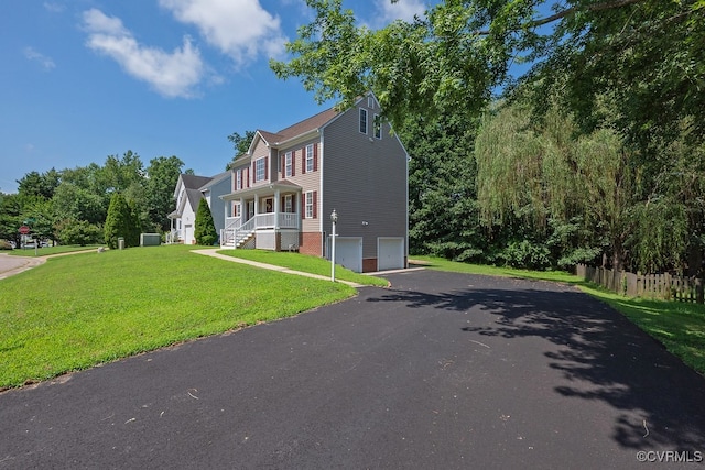 5636 Charter Oak Dr, Chesterfield, VA 23832 - view of front facade with asphalt driveway, a garage, and a porch