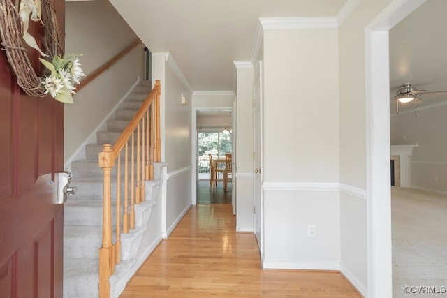 5636 Charter Oak Dr, Chesterfield, VA 23832 - foyer with ceiling fan, stairway, light wood-style flooring, ornamental molding, and a fireplace